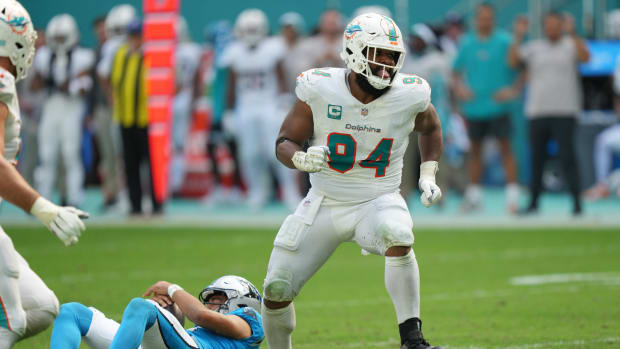 Miami Dolphins defensive tackle Christian Wilkins (94) celebrates a sack of Carolina Panthers quarterback Bryce Young (9) during the fourth quarter of an NFL game at Hard Rock Stadium in Miami Gardens, Oct. 15, 2023.